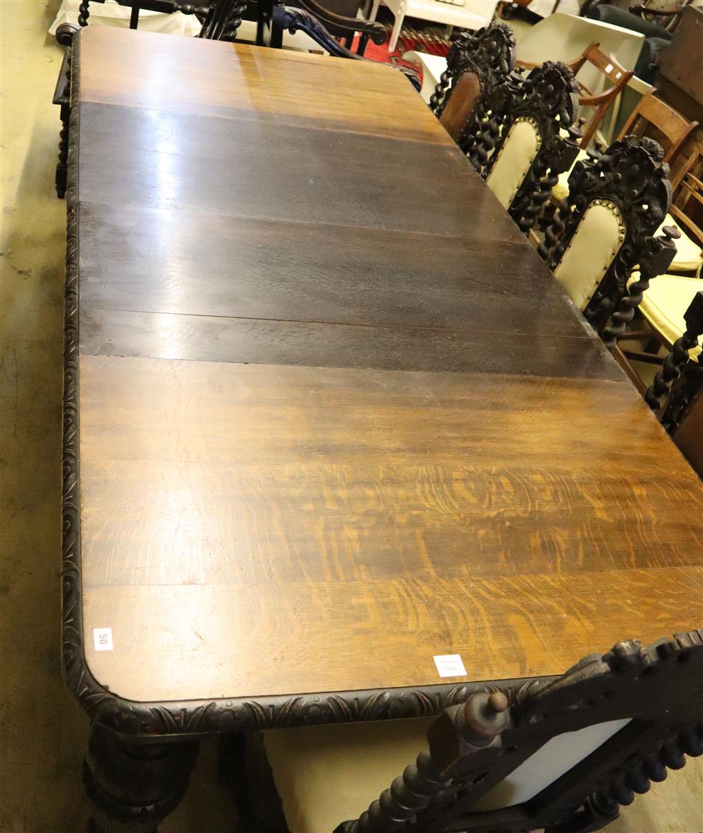 A Victorian carved oak extending dining table, with two spare leaves, length 244cm extended, width 118cm, height 78cm